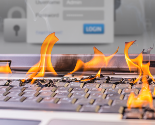 computer keyboard on fire with keys melting